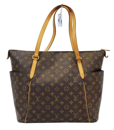 louis vuitton tote bag selfridges|Louis Vuitton cream shoulder bag.